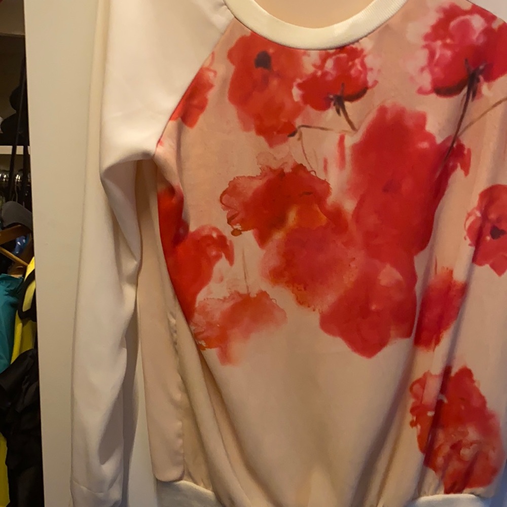 White and flowery blouse